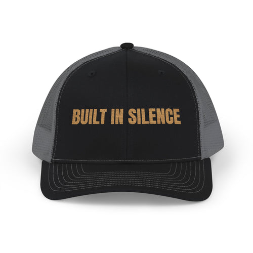 Built In Silence Snapback Trucker Cap — Bold Gold Embroidered Mesh Hat